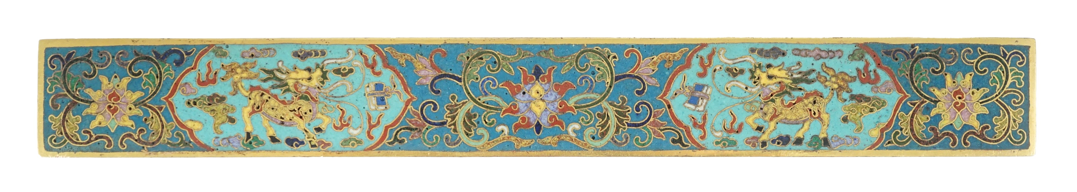 A Chinese cloisonné enamel and gilt bronze scroll weight, 24.8cm long